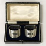 PAIR OF BOXED SILVER NAPKIN RINGS