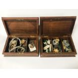 2 CARVED WOODEN JEWELLERY BOXES WITH CONTENTS