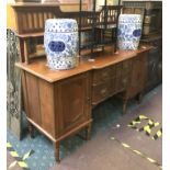 MAHOGANY BREAKFRONT SIDEBOARD WITH MIRROR BACK