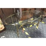 OVAL GLASS & BRASS COFFEE TABLE