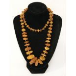 BUTTERSCOTCH AMBER NECKLACE - APPROX. 34 INCHES - 64 grams