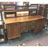 MAHOGANY BREAKFRONT SIDEBOARD WITH MIRROR BACK