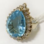 14CT YELLOW GOLD BLUE TOPAZ (18.84CT) WITH DIAMOND SURROUND RING -SIZE I & FULL CERTIFICATE