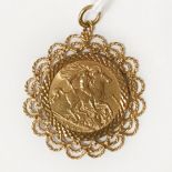 1909 HALF SOVEREIGN IN 9CT GOLD PENDANT MOUNT