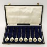 CASED SET OF 8 SILVER & ENAMELLED BEAN SPOONS