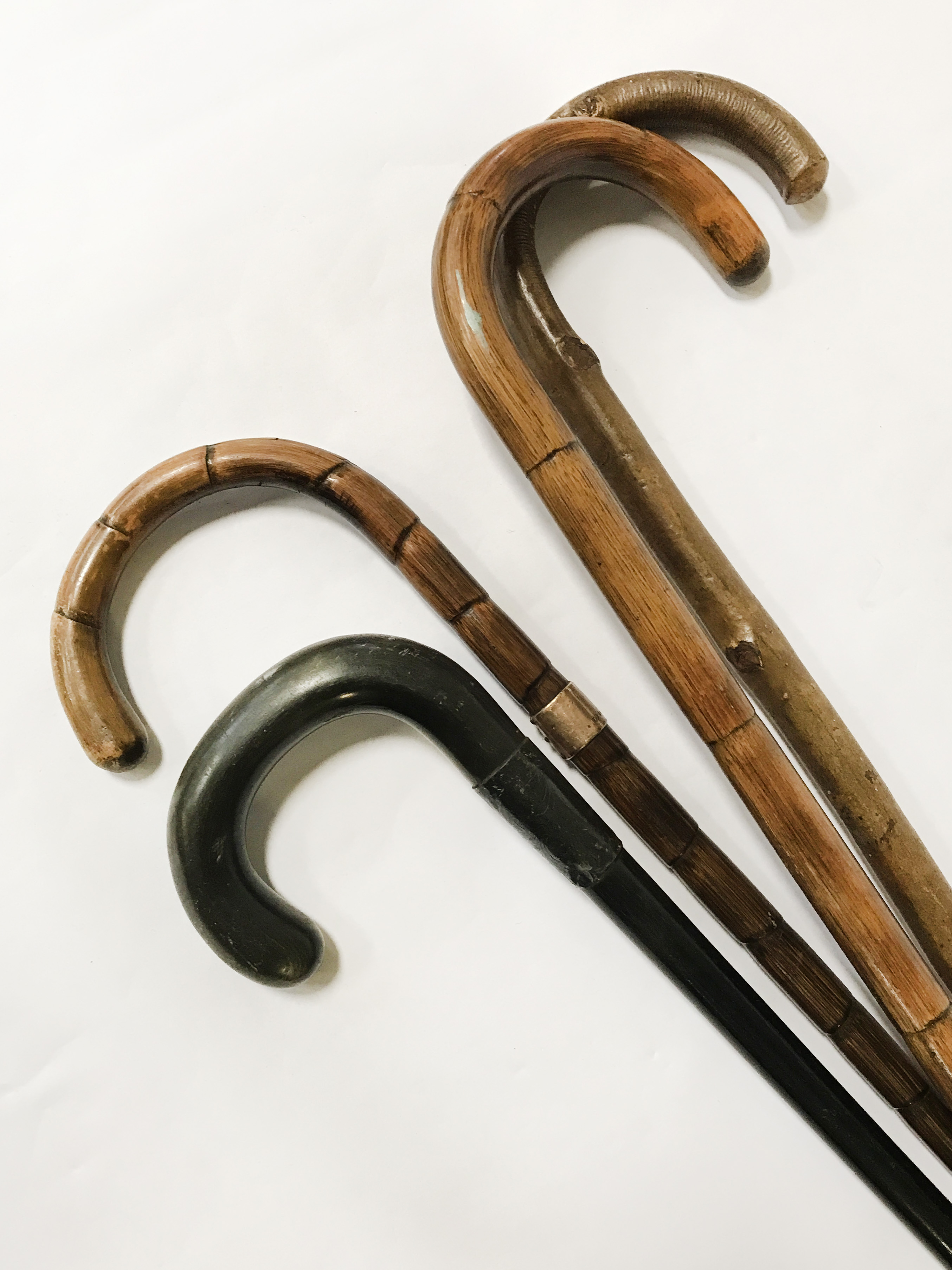 4 WALKING STICKS - 1 WITH 9 CT. GOLD BAND