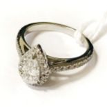 PLATINUM DIAMOND RING TOTAL 1 CARAT CENTRE STONE PEAR SHAPE HALF CARAT E COLOUR SI1 CLARITY WITH G.