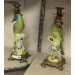 PAIR BRONZE & PORCELAIN PARROT CANDLE HOLDERS - 35 CMS (H)