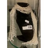 UNUSUAL MULTI STRAND PEARL NECKLACE WITH 14CT GOLD INTERSPACED BALLS