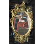 LARGE GILTWOOD MIRROR IN BAROQUE STYLE