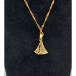 14CT GOLD CHAIN AND A 14CT GOLD & DIAMOND PENDANT