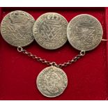 UNUSUAL BROOCH MADE FROM EARLY SPANISH NETHERLANDS SILVER COINS