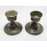 PAIR STERLING SILVER EMBOSSED CANDLESTICKS - 9 CMS (H)