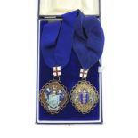 THE WORSHIPFUL COMPANY OF BASKETMAKERS TWO HALLMARKED SILVER JEWELS / MEDALS WITH COLLARS