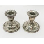 PAIR SMALL STERLING SILVER CANDLESTICKS - 7 CMS (H)