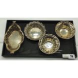 FOUR HM SILVER PIERCED DISHES - LONGEST 18 CMS - TOTAL 8 ozs