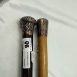 TWO VICTORIAN STICKS WITH SILVER HANDLES