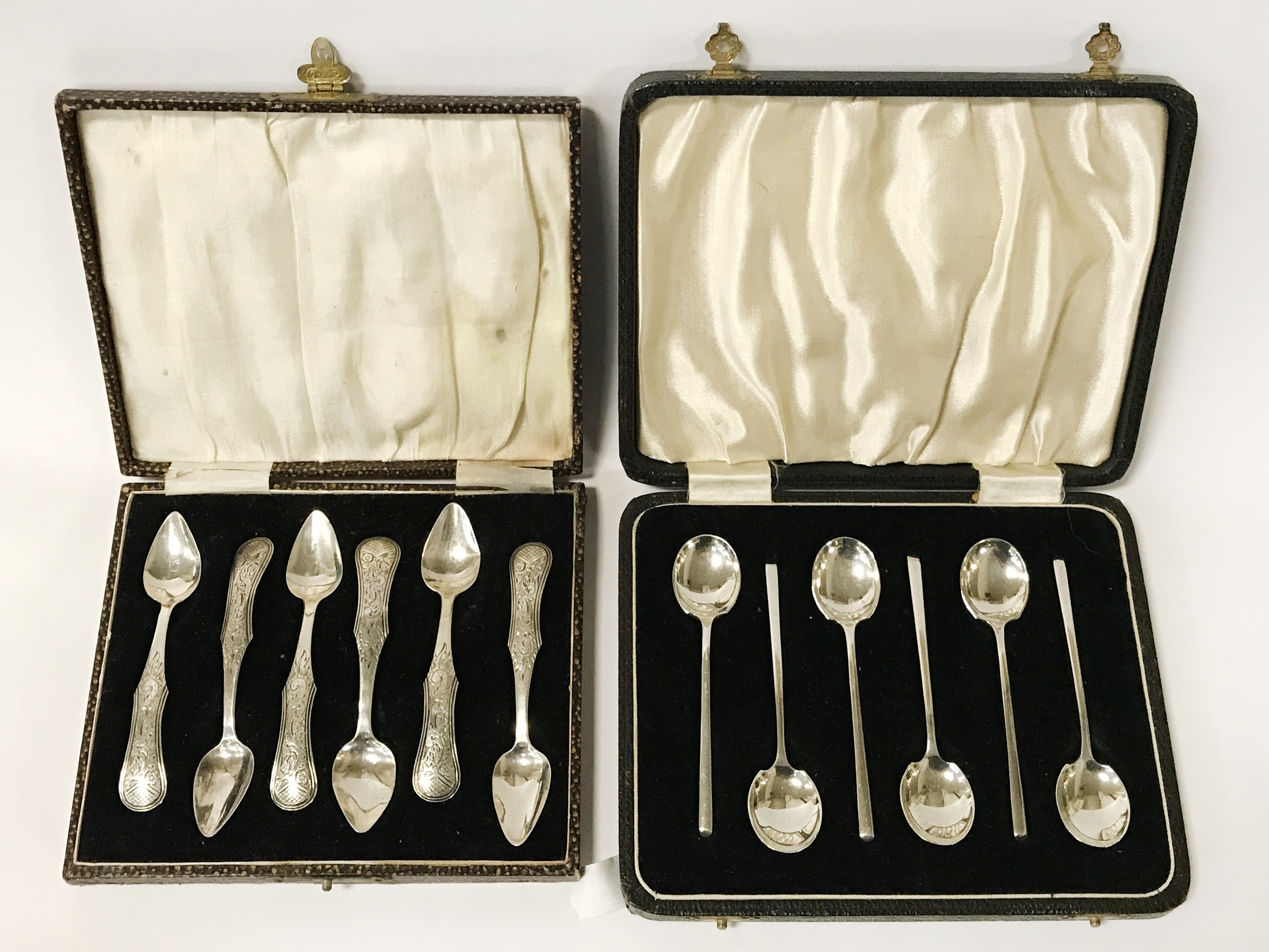 TWO CASED SETS OF SILVER SPOONS