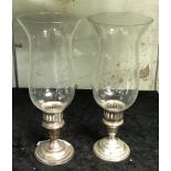 PAIR STERLING SILVER & GLASS STORM LAMPS - 30 CMS (H)