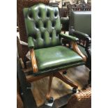 GREEN LEATHER CAPTAINS CHAIR