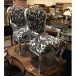 PAIR BLACK FLORAL CHAIRS