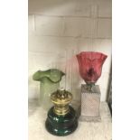 TWO OIL LAMPS - LARGEST 40 CMS & SMALLEST 36 CMS