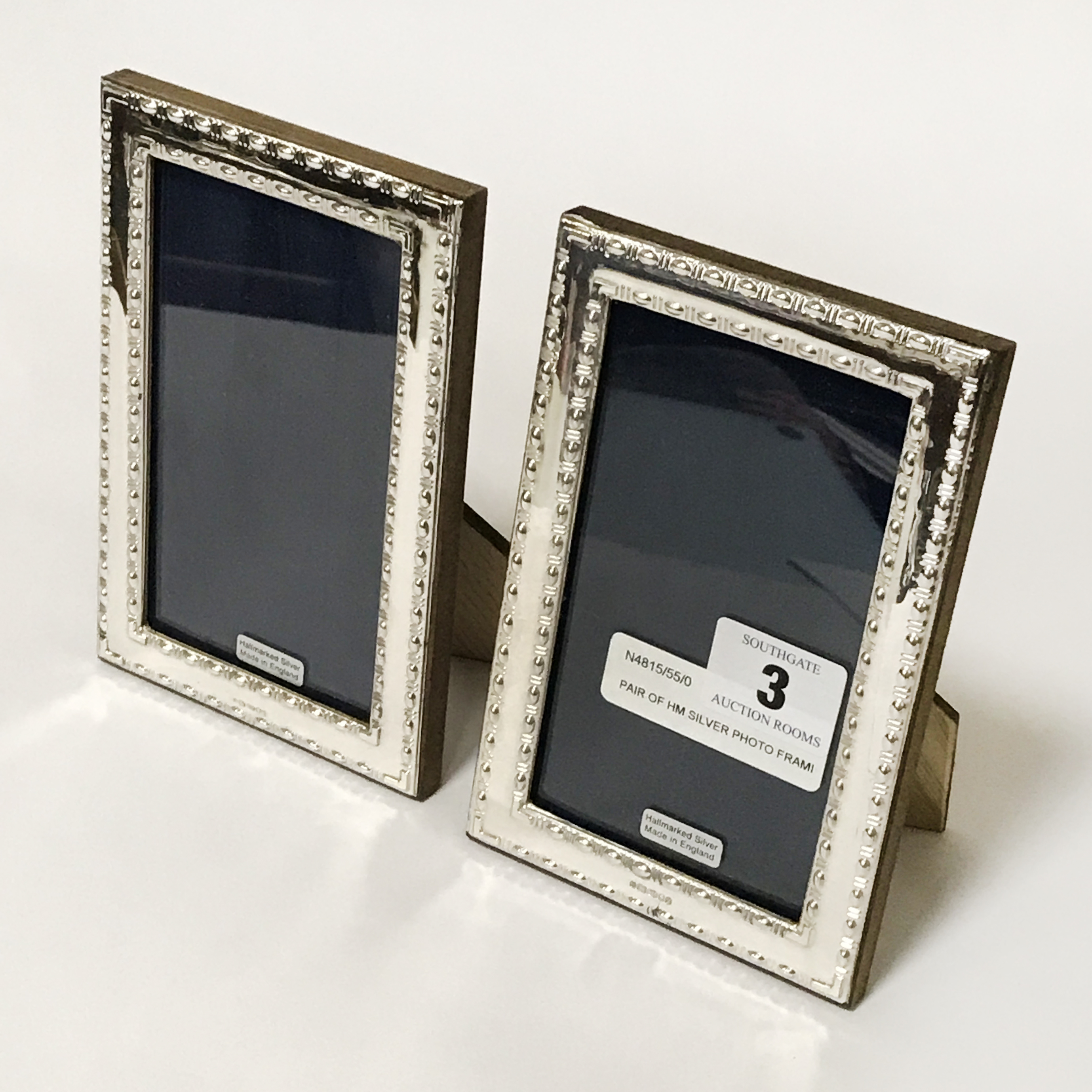 PAIR OF HM SILVER PHOTO FRAMES 15CM X 10CM