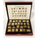 BOXED SET OF SILVER GILT STAMPS