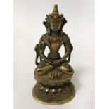 GILT BRONZE CHINESE BUDDHA WITH INSERTED STONES 17CMS (H)