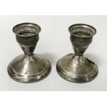 PAIR OF STERLING SILVER CANDLESTICKS 9CMS (H)