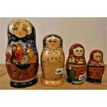 A Russian set of four dolls, 22 to 13 cm.