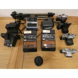 A quantity of SLR camera's, to include Canon EOS 3000, Zenit EM, Praktica MTL3 and others (2).