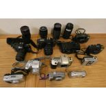 A collection of camera's and lens, to include Olympus, Nikon and Yashica (2).