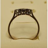 A 9ct gold three stone diamond ring, size N 1/2.
