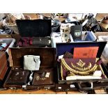 A collection of Masonic regalia, to include 5 cases with aprons and three boxes of aprons.
