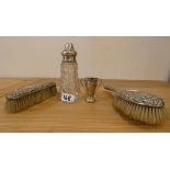 A silver and cut glass sugar castor, Sheffield 1928 and three other silver items.