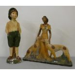 An Art Deco cold painted plaster figure of a lady with two Borzoi, height 53 cm and another of a boy