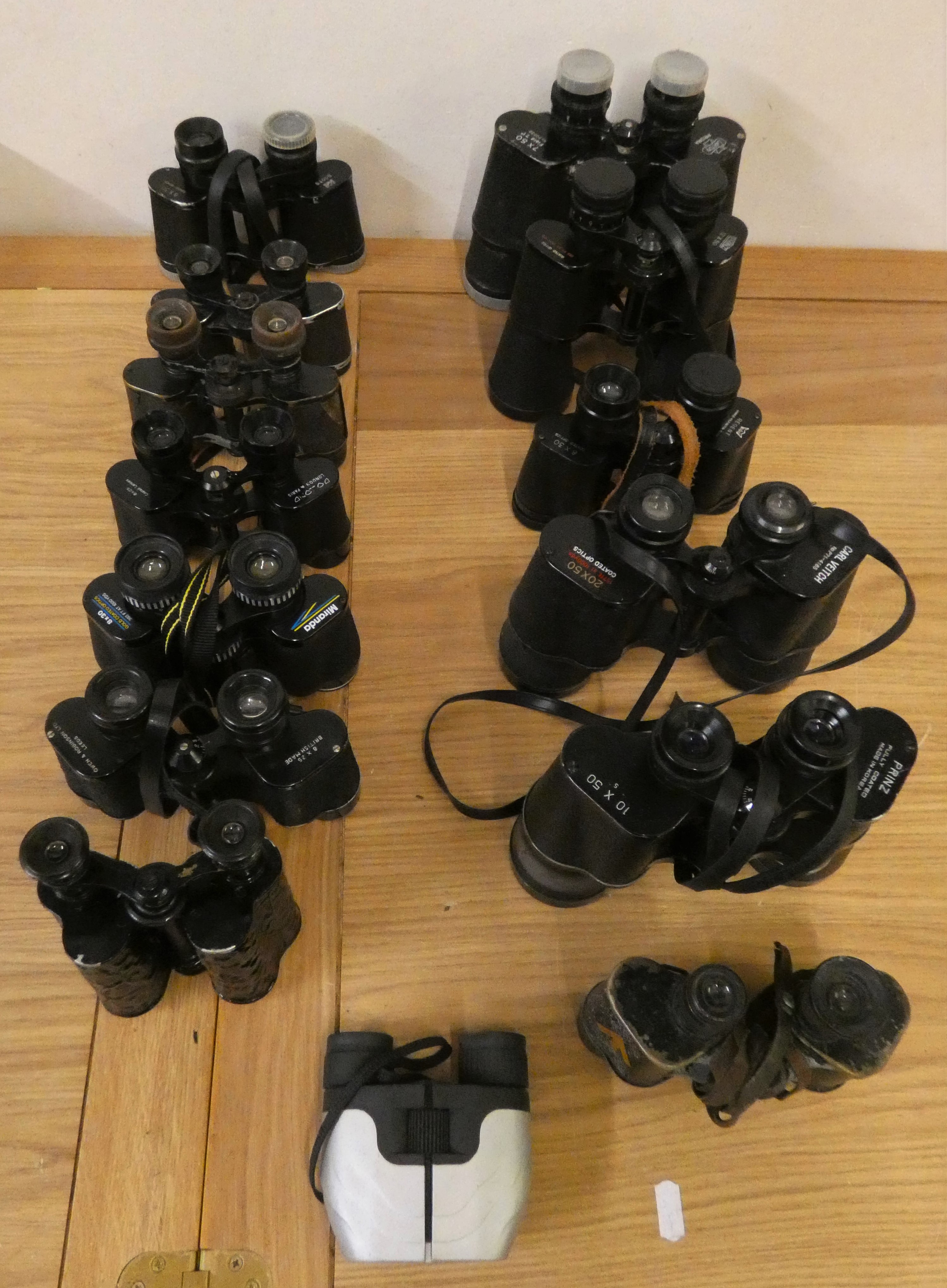 Thirteen pairs of binoculars, mainly cased, to include Lumex, Yashica and Regent-Helios.