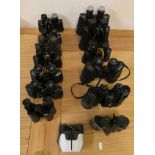 Thirteen pairs of binoculars, mainly cased, to include Lumex, Yashica and Regent-Helios.