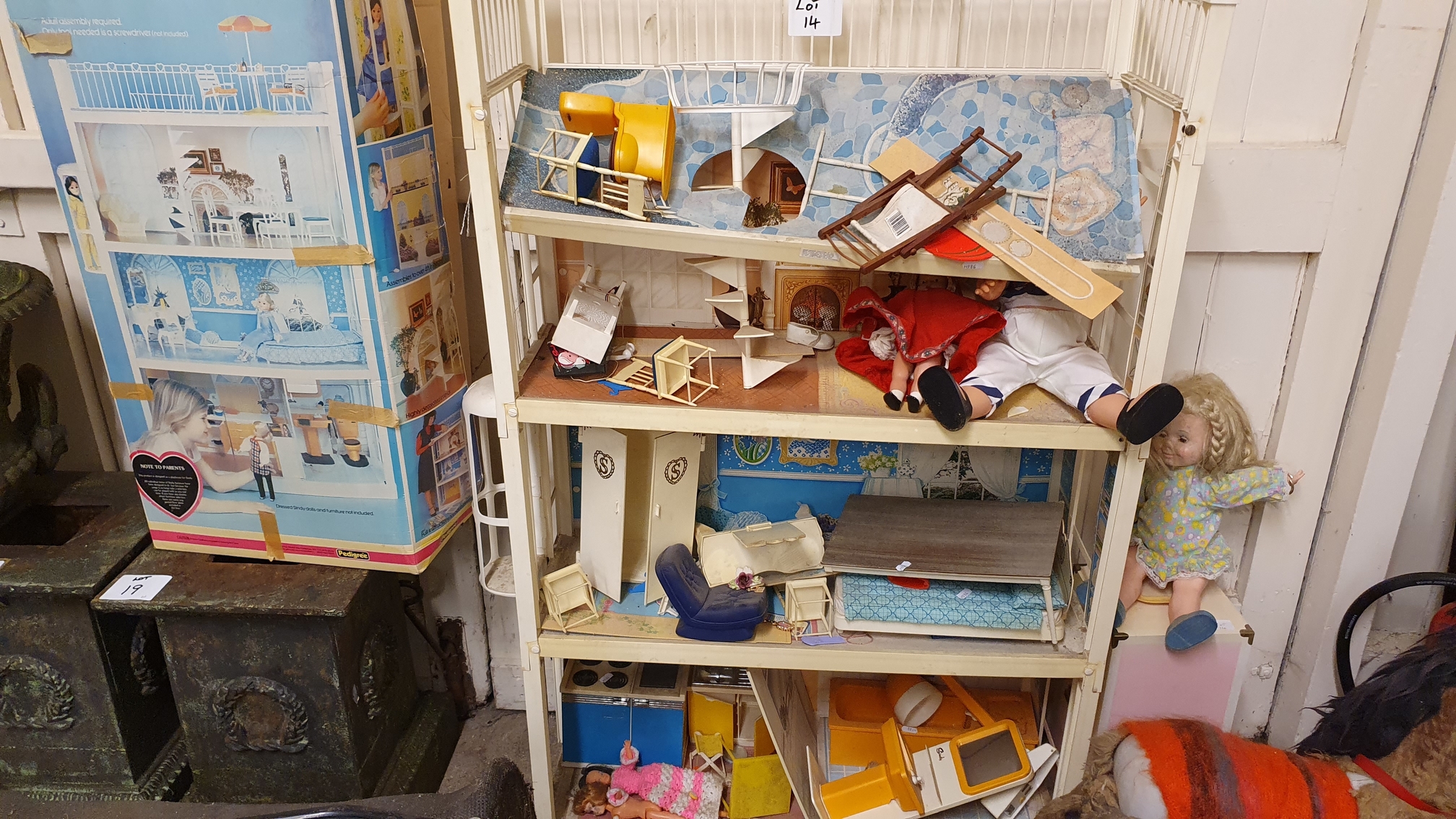 A Sindy Doll House with furniture and box, together with a sit on donkey.