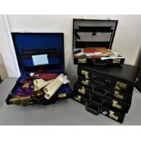 A collection of Masonic regalia, to include 7 cases with aprons and a bag of regalia and books.