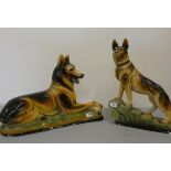 An Art Deco cold painted plaster figure of a recumbent German Shepherd dog, length 57 cm and another