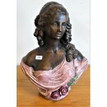 A bust of a young women in a pink dress. 64cm tall.