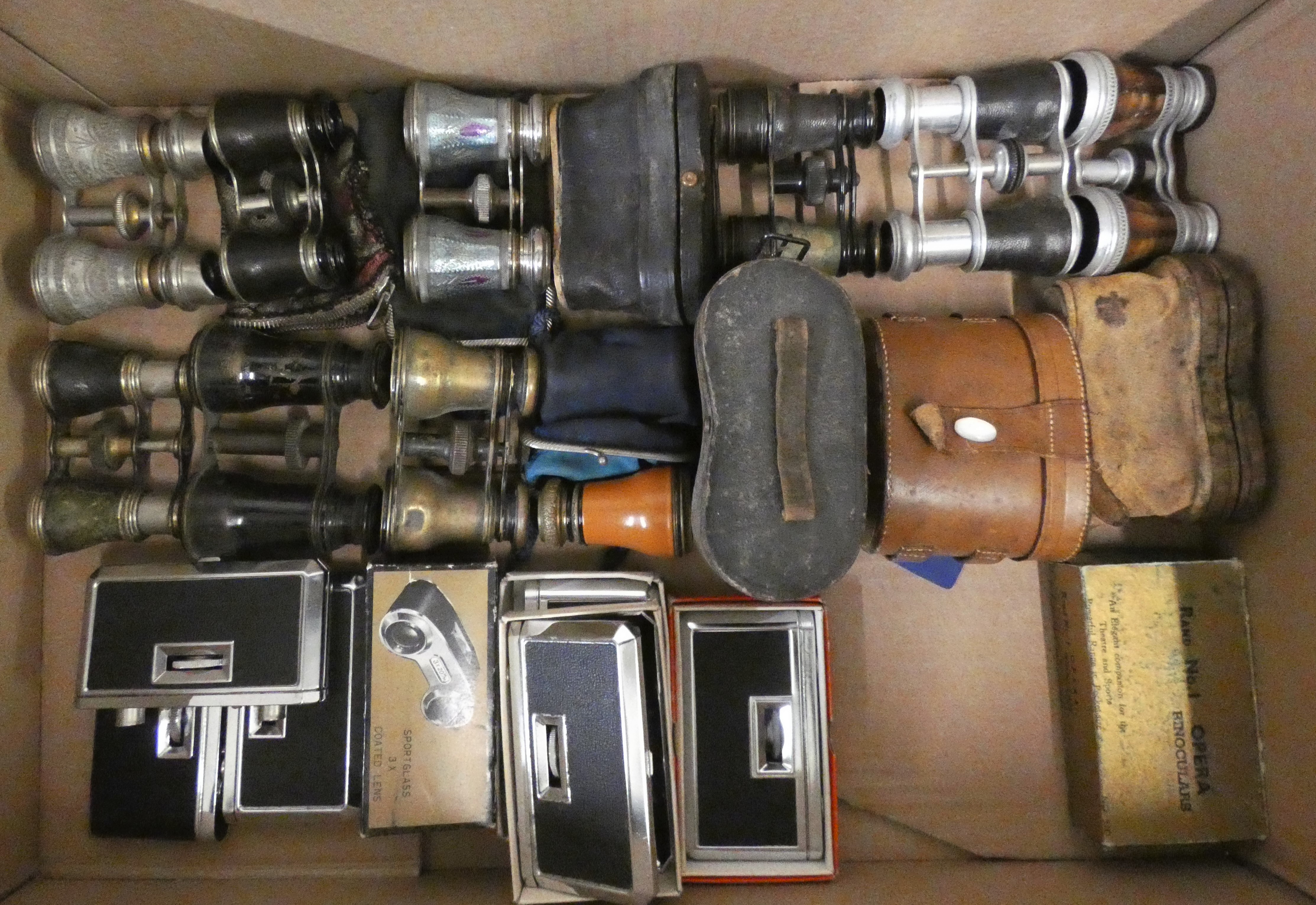 Fourteen pairs of un-named Opera glasses and 8 pairs of Opera binoculars, some cased.