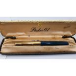 A Parker 61 fountain pen with gilt cover, case.