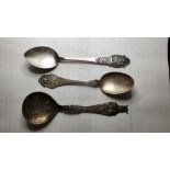 A Hans Hansen Norwegian decorative spoon and two other spoons.