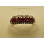 A 585 standard gold red and white stone ring, size Q, 3 gms.