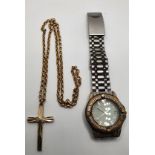 A silver gilt cross on a 9ct gold chain (chain 10 gm) and a Sekonda wristwatch