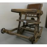 A Victorian beech metamorphic chair, converting from a rocking chair to a high chair, wheels, one