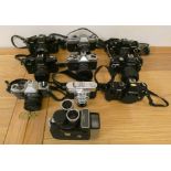 A collection of SLR camera's, to include Yashica FR1, FX-2, FR, FXD, Praktica BX20, BC1, Nikon